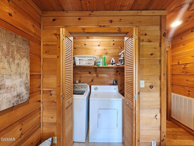 3216 Emerald Springs Loop, Sevierville, TN 37862 - washroom featuring wooden walls, washer and dryer, and wooden ceiling