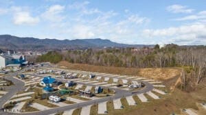 birds eye view of property with a mountain view