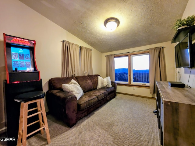 carpeted living room with vaulted ceiling, baseboards, and a textured ceiling