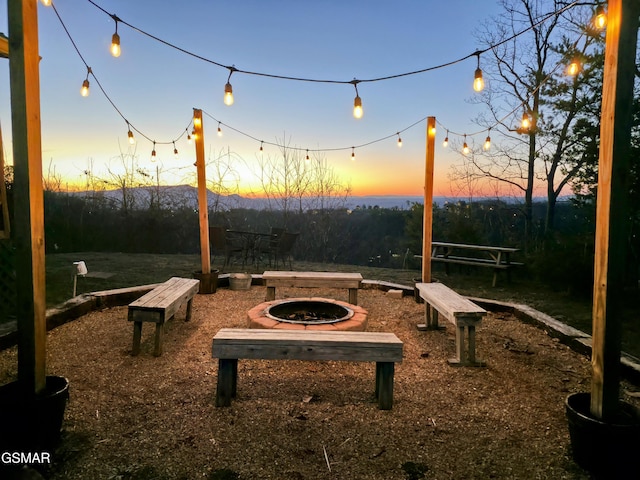 view of property's community featuring a fire pit