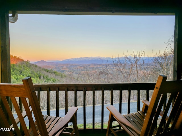 balcony featuring a mountain view