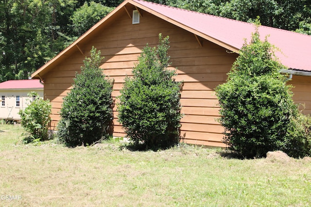 4845 Hooper Hwy, Cosby, TN 37722 - view of side of home with a lawn and a garage