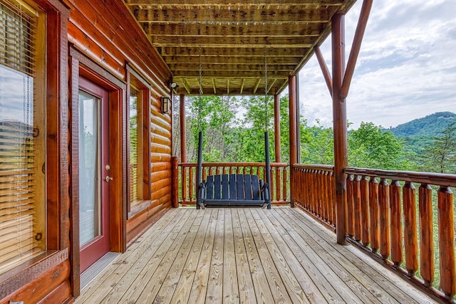 wooden deck featuring covered porch