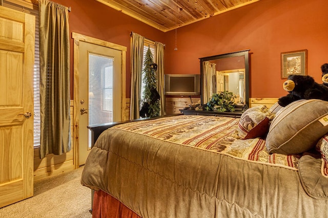 bedroom with light colored carpet, ornamental molding, and wood ceiling