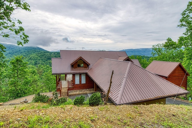 view of front of property with a mountain view