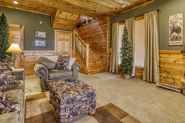 living room with carpet, wood walls, and wood ceiling