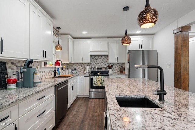 4325 San Juan Ln, Knoxville, TN 37914 - kitchen with appliances with stainless steel finishes, a sink, white cabinetry, and recessed lighting