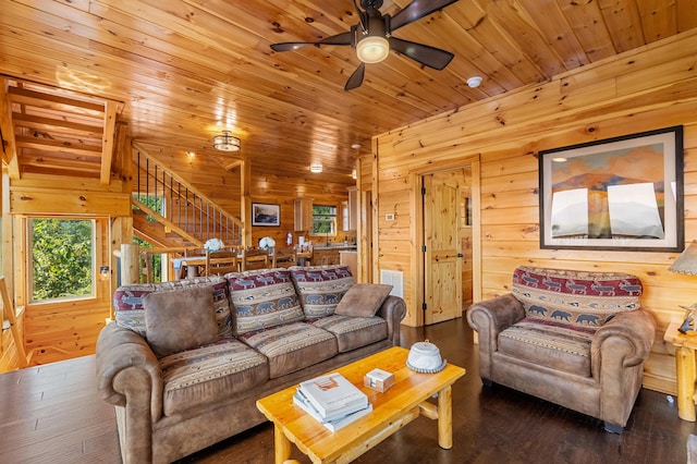 living room featuring wood walls, ceiling fan, wooden ceiling, and hardwood / wood-style flooring