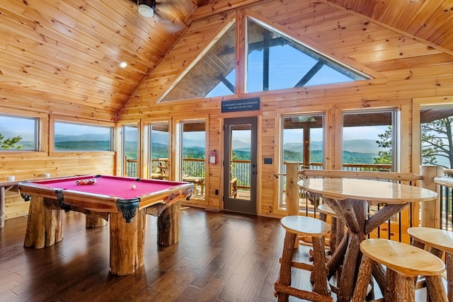 rec room featuring a mountain view, dark hardwood / wood-style flooring, wooden ceiling, and pool table