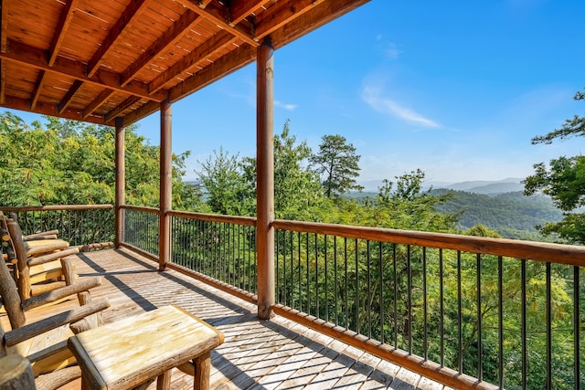 wooden terrace with a mountain view