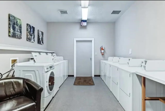 laundry area featuring independent washer and dryer