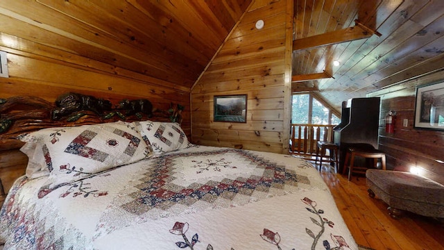 bedroom featuring hardwood / wood-style floors, lofted ceiling, wooden walls, and wood ceiling