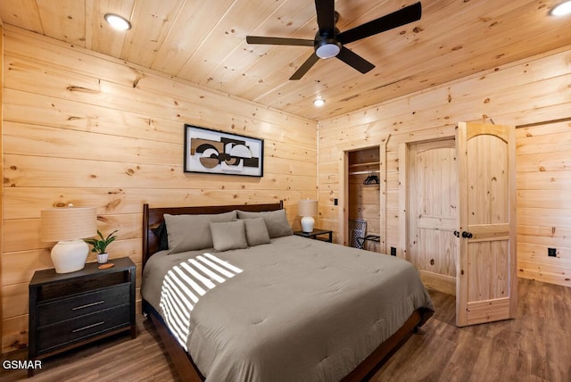 bedroom featuring wooden ceiling, wood walls, and wood finished floors