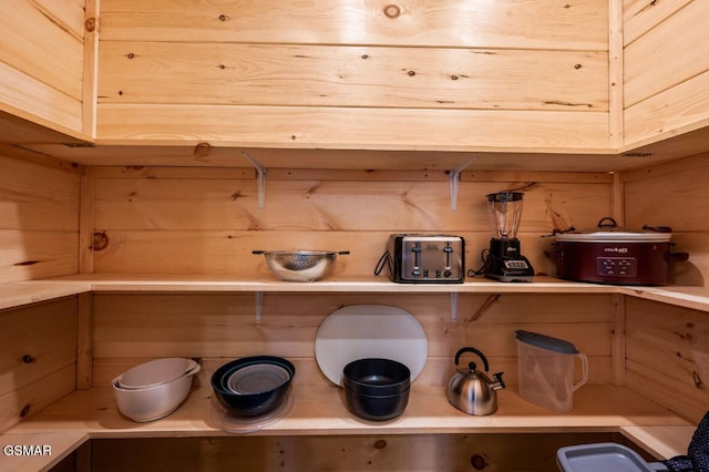 details with light countertops and light brown cabinetry