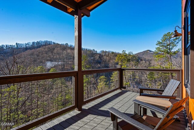 deck featuring a mountain view