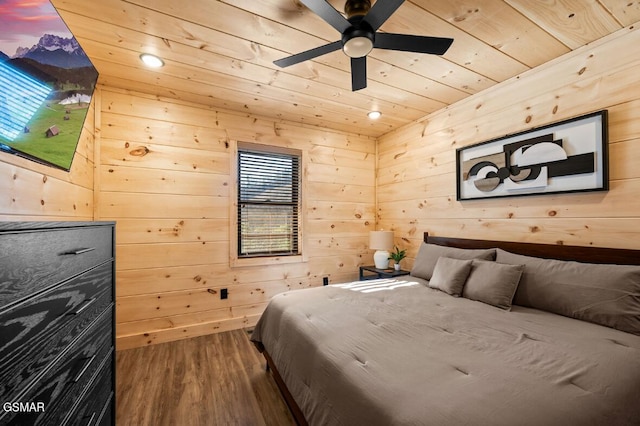 bedroom featuring recessed lighting, wood ceiling, wood walls, and wood finished floors