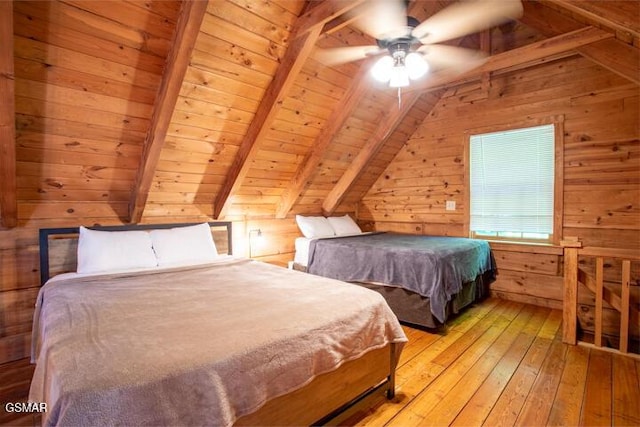 3637 Marshall Ln, Sevierville, TN 37862 - bedroom with wooden ceiling, wood walls, light wood-style flooring, and a ceiling fan
