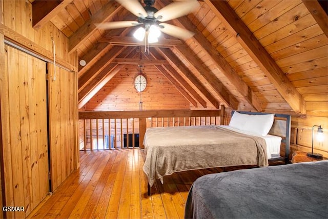 3637 Marshall Ln, Sevierville, TN 37862 - bedroom featuring wood ceiling, wood walls, and hardwood / wood-style floors
