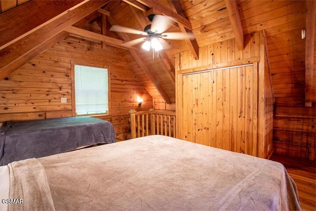 3637 Marshall Ln, Sevierville, TN 37862 - bedroom featuring wood walls, wood finished floors, wooden ceiling, and ceiling fan