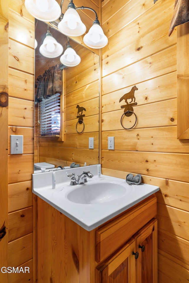 2494 Black Bear Ridge Way, Sevierville, TN 37862 - bathroom with vanity and wooden walls