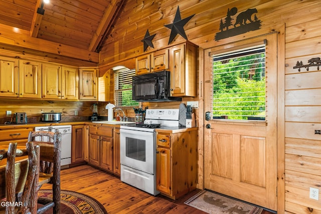 2494 Black Bear Ridge Way, Sevierville, TN 37862 - kitchen with white appliances, light wood-style flooring, wood ceiling, and wood walls