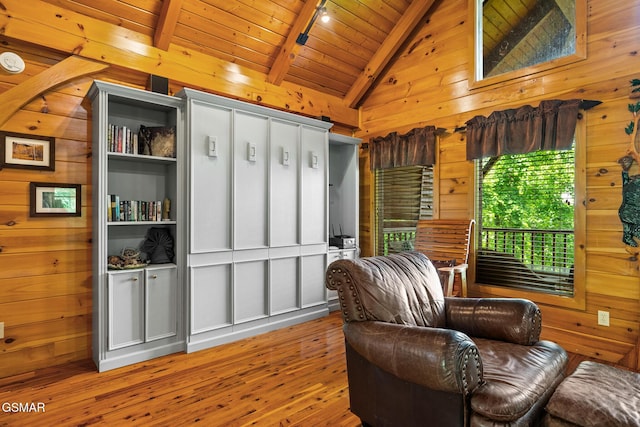 2494 Black Bear Ridge Way, Sevierville, TN 37862 - sitting room with hardwood / wood-style floors, wood walls, wood ceiling, and rail lighting