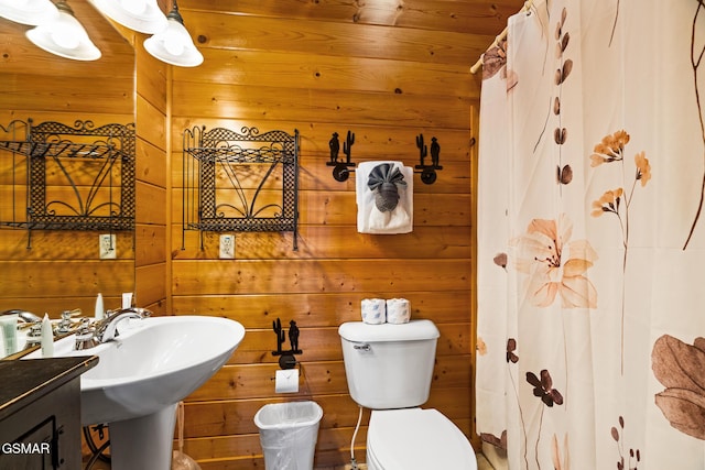 2494 Black Bear Ridge Way, Sevierville, TN 37862 - full bath with wooden walls and a shower with curtain