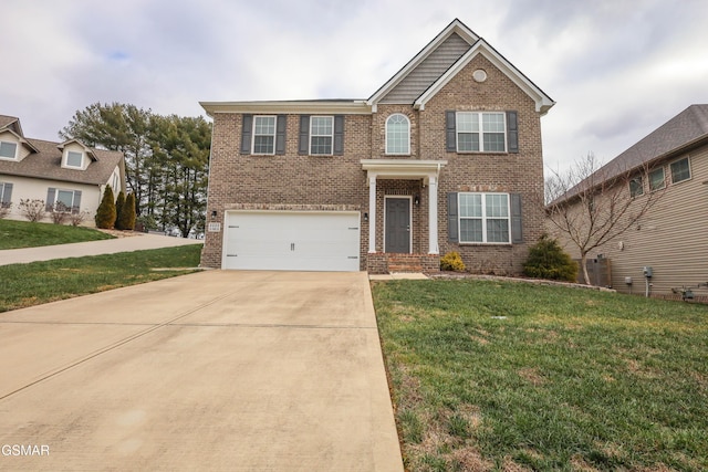 view of front of property with a front lawn and a garage