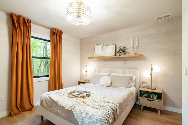 1008 Glades Rd, Gatlinburg, TN 37738 - bedroom featuring baseboards and wood finished floors