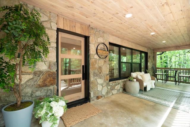 1008 Glades Rd, Gatlinburg, TN 37738 - entrance to property featuring stone siding and a porch