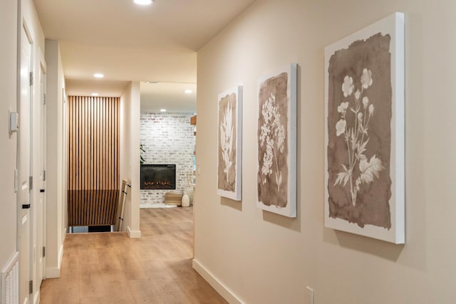 1008 Glades Rd, Gatlinburg, TN 37738 - corridor with light wood-style flooring, recessed lighting, and baseboards