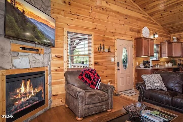 living room with a fireplace, dark hardwood / wood-style flooring, wooden ceiling, and wood walls