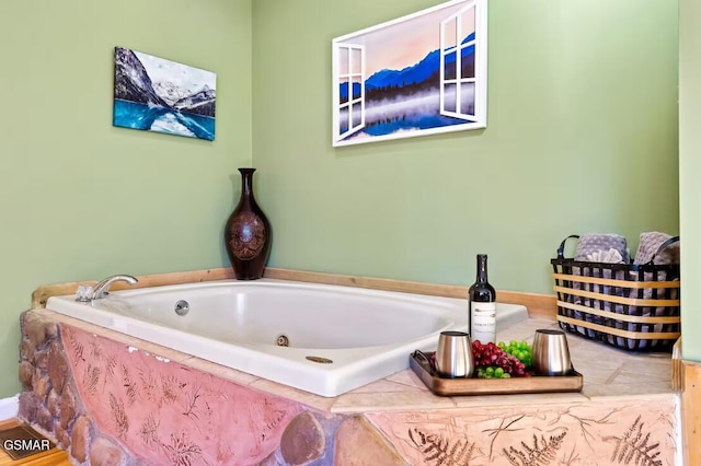 bathroom with a relaxing tiled tub