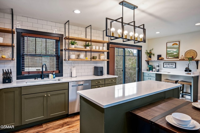 kitchen with open shelves, stainless steel dishwasher, and a sink