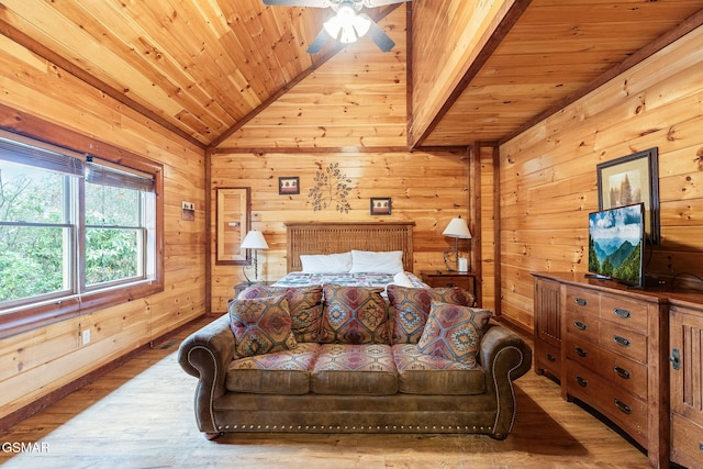 bedroom with ceiling fan, wood ceiling, vaulted ceiling, and light hardwood / wood-style floors