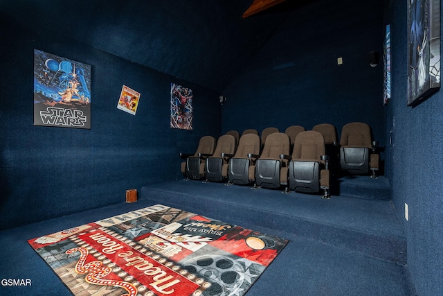 home theater with lofted ceiling and carpet flooring