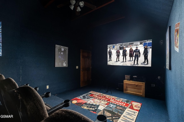 home theater featuring ceiling fan and carpet floors