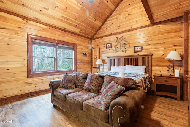 bedroom featuring wooden ceiling, vaulted ceiling, wood walls, and wood finished floors