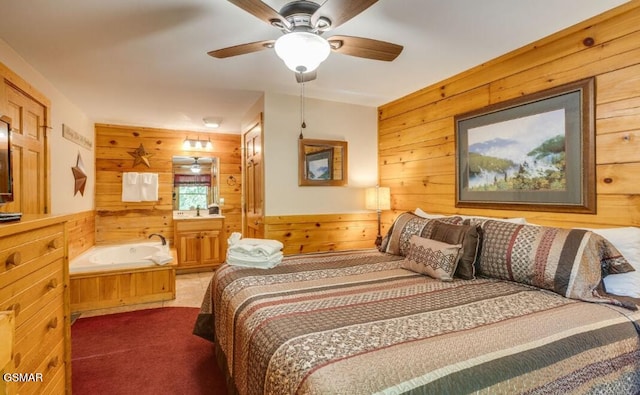 carpeted bedroom featuring ceiling fan and wooden walls