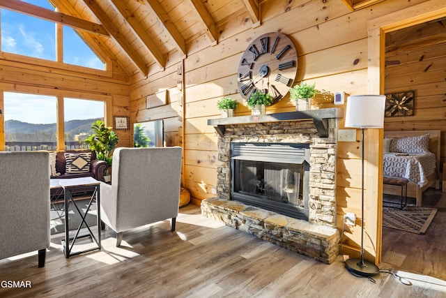 living room featuring wooden ceiling, beamed ceiling, wooden walls, and wood finished floors