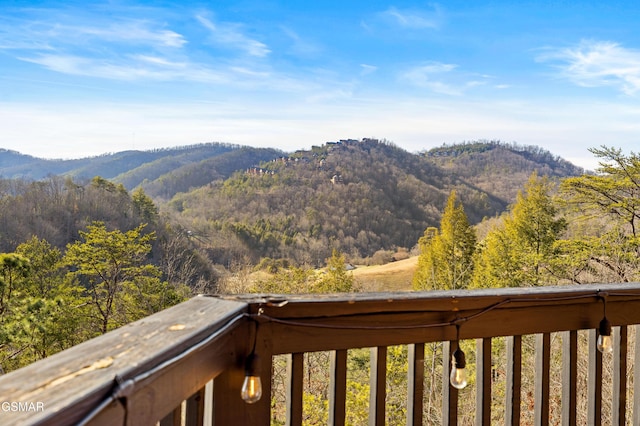 view of mountain feature with a wooded view