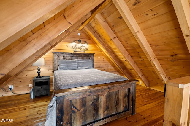 bedroom featuring wood ceiling, wood-type flooring, wooden walls, and lofted ceiling with beams