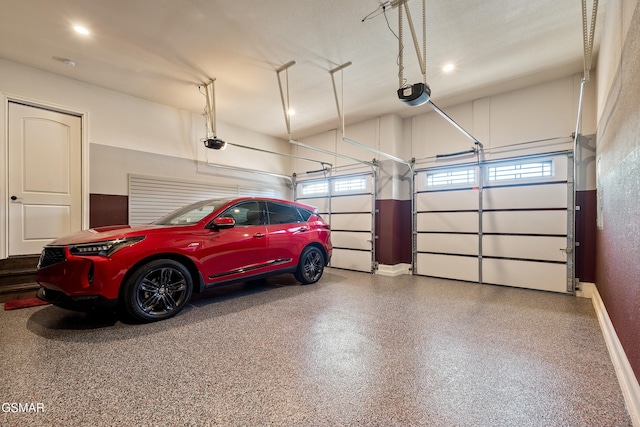 garage featuring a garage door opener