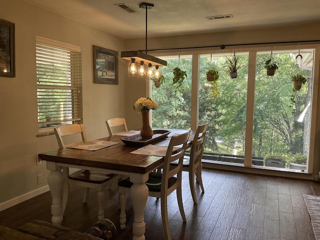 dining room featuring dark hardwood / wood-style floors