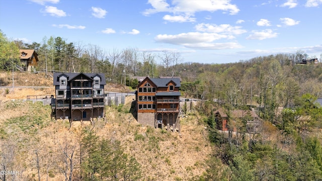 view of yard featuring fence and a wooden deck