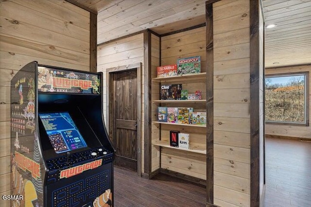 game room with wooden ceiling, wood walls, and hardwood / wood-style flooring