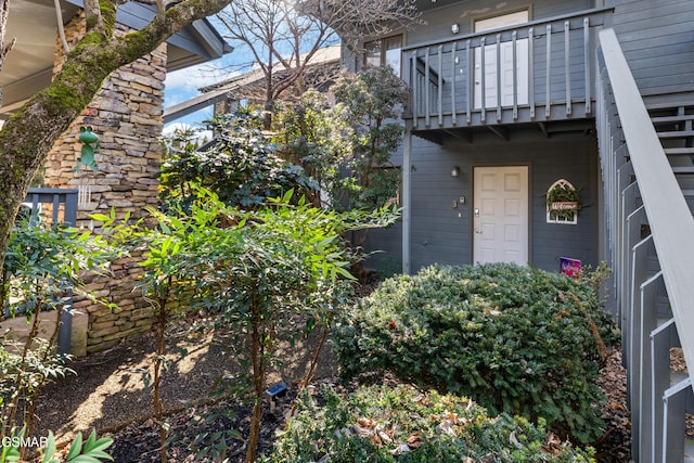 property entrance with a balcony