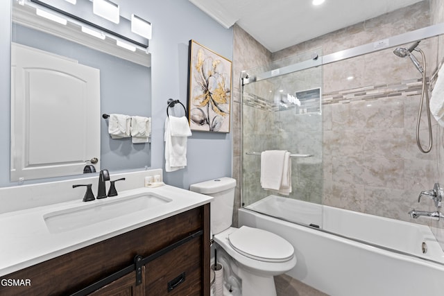 full bathroom with vanity, toilet, and combined bath / shower with glass door