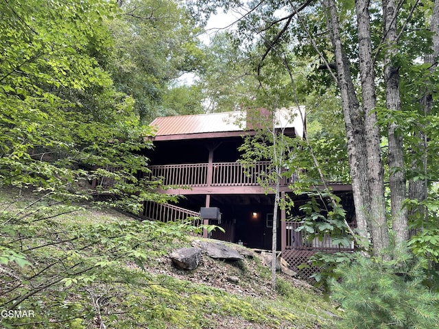 910 Laurel Lick Rd, Pigeon Forge, TN 37863 - back of house with a deck and metal roof