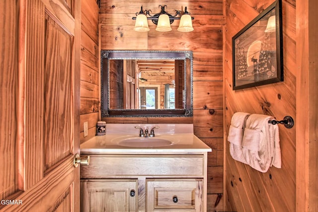 910 Laurel Lick Rd, Pigeon Forge, TN 37863 - bathroom featuring wood walls and vanity
